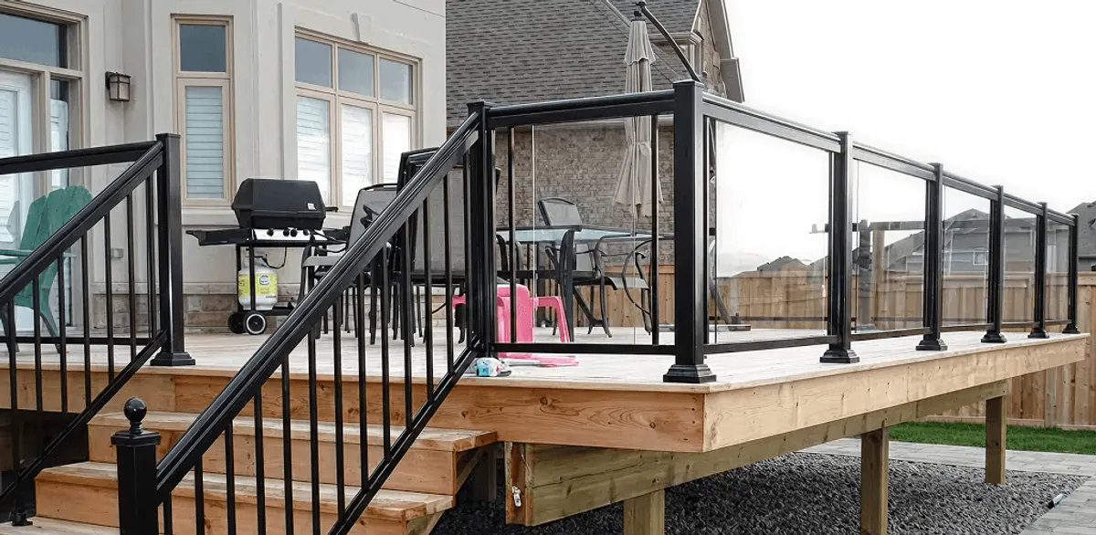 Handrail installation on a deck staircase for safety and code compliance in Boise, ID